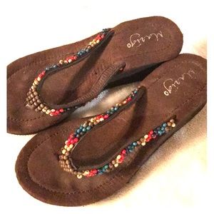 Marigo  beaded flip flops  size 7. Like New